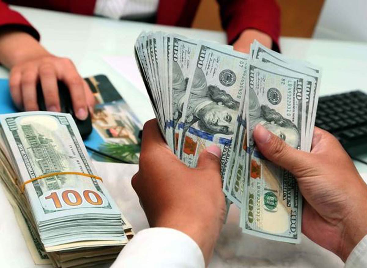 Tỷ giá chịu nhiều áp lực và động thái can thiệp từ NHNN - Ảnh 1 Tỷ giá chịu nhiều áp lực và động thái can thiệp từ NHNN - Ảnh 1
