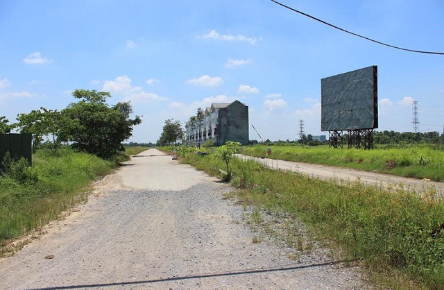 Nhiều doanh nghiệp ôm hàng trăm nghìn m2 đất rồi ‘bỏ hoang’ - Ảnh 1