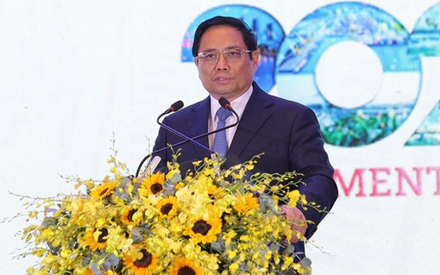 Thủ tướng Ch&iacute;nh phủ Phạm Minh Ch&iacute;nh Diễn ph&aacute;t biểu tại Diễn đ&agrave;n đầu tư Đ&agrave; Nẵng 2022 (Nguồn ảnh: B&aacute;o đầu tư) &nbsp;