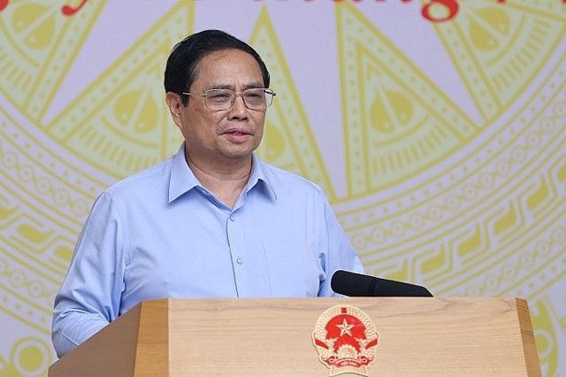 Thủ tướng: Hạ tiếp lãi suất, nới điều kiện vay cho doanh nghiệp vừa và nhỏ - Ảnh 1