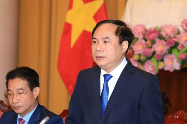 Thứ trưởng X&acirc;y dựng Nguyễn Văn Sinh trả lời tại họp b&aacute;o s&aacute;ng 25/12.