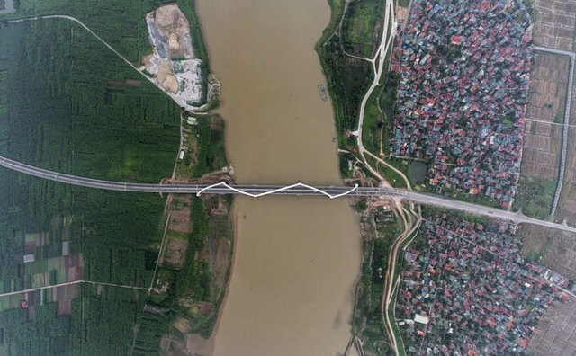Toàn cảnh cây cầu vòm thép 1.900 tỷ đồng cao nhất Việt Nam, mang hình tượng rồng thời Lý uốn lượn như hình chữ S - Ảnh 2
