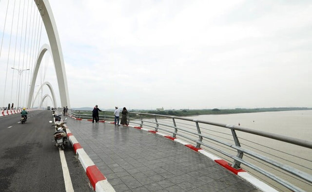 Toàn cảnh cây cầu vòm thép 1.900 tỷ đồng cao nhất Việt Nam, mang hình tượng rồng thời Lý uốn lượn như hình chữ S - Ảnh 3