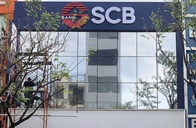 SCB đóng cửa một loạt phòng giao dịch, thanh lý hàng chục ô tô - Ảnh 1