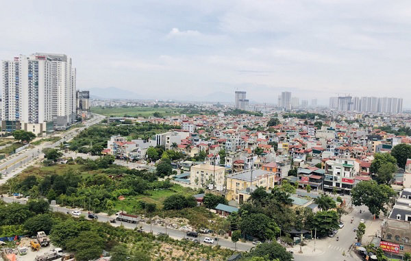 Cần đánh thuế hiệu quả để kiềm chế giá nhà đất - Ảnh 1