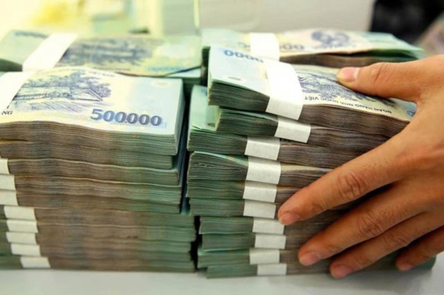 Tiền gửi khách hàng tại ngân hàng lập kỷ lục mới - Ảnh 1