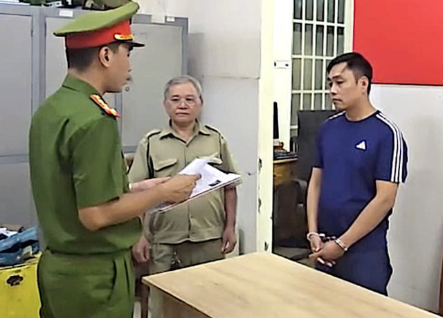 Cơ quan CSĐT C&ocirc;ng an Tp. Đ&agrave; Nẵng bắt giữ Đỗ Th&agrave;nh Nhung (ảnh CA)