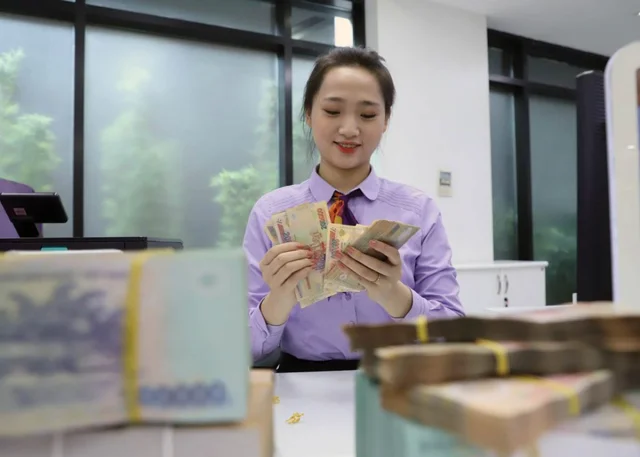 Tỷ giá tăng nóng, NHNN có động thái mới về tăng trưởng tín dụng - Ảnh 1